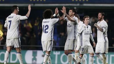 Real Madrid players celebrate after defeating Villarreal. Miguel Angel Polo / EPA