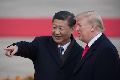 A meeting between China's President Xi Jinping and US President Donald Trump in Beijing in 2017. AFP