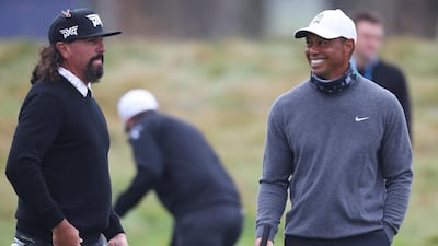 Tiger Woods talks with Pat Perez during a practice round prior to the 2020 PGA Championship at TPC Harding Park. AFP