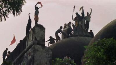 Hindu fundamentalists celebrate the destruction of the Babri mosque in 1992.