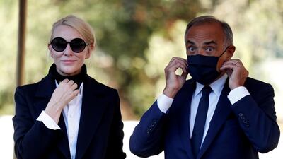 Cate Blanchett stands next to the director of the 77th Venice International Film Festival, Alberto Barbera, as she arrives. Reuters