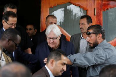 UN envoy to Yemen Martin Griffiths (C) is escorted by bodyguards as he arrives at Sanaa airport in Yemen on June 16, 2018. Khaled Abdullah / Reuters