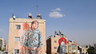 A four-piece mural installation in East Amman, featuring work by Fintan Magee (Australia), Suhaib Attar (Jordanian), Dina Saadi (Syrian-Russian based in Dubai) and Hombre SUK (Germany). Courtesy Baladk Project