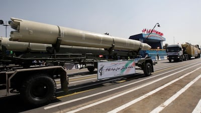 A Qiam missile, the kind believed to have been fired by Yemeni rebels at Saudi Arabia, is displayed by Iran's Revolutionary Guard during a military parade. Vahid Salemi / AP Photo