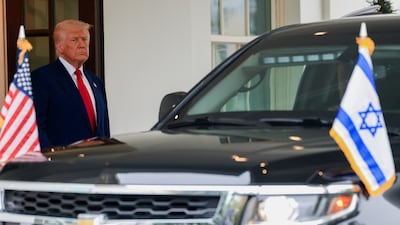 US President Donald Trump waits for Israeli Prime Minister Benjamin Netanyahu in Washington on Monday. Reuters