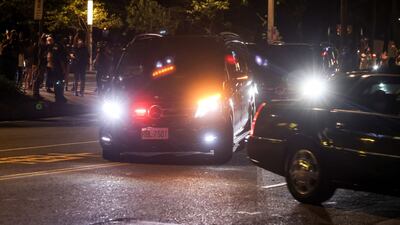 The convoy carrying Ms Pelosi arrives at the Grand Hyatt. Bloomberg