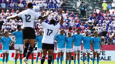Uruguay players stand as Fiji players perform the Cibi prior to the Rugby World Cup 2019 Group D game between Fiji and Uruguay at Kamaishi Recovery Memorial Stadium in Kamaishi, Iwate, Japan. Getty Images