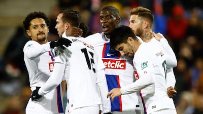 Paris Saint-Germain's Carlos Soler celebrates scoring against Chateauroux with Sergio Ramos and teammates. Reuters