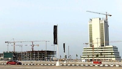 There is a frenzy of construction activity in Lusail, Qatar's newest planned city, on the outksirts of Doha. Emre Rende for The National
