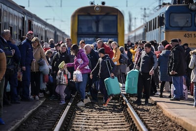 Ukrainian refugees arriving in Hungary in 2022, shortly after Russian forces invaded. Getty Images