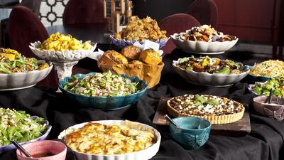 Iftar The One Jumeirah Deli includes courgette and halloumi salad, salmon and artichoke tart and hummus soup. Courtesy The One