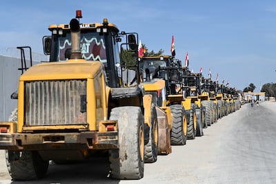Reconstruction equipment bound for Gaza waits to cross the Rafah border point between Egypt and the Gaza Strip, in Rafah, Egypt, February 2025. EPA