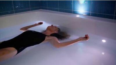 Penny Brewer, the director of Point Zero Flotation Centre, demonstrates flotation therapy. Sammy Dallal / The National