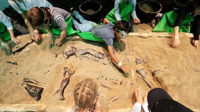 Children participate in the dig-a-dinosaur activity at last year’s Abu Dhabi Science Festival. Christopher Pike / The National
