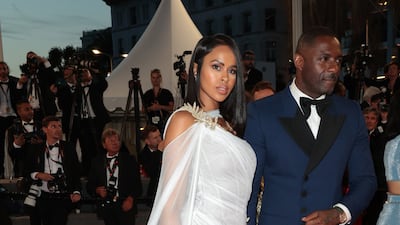Sabrina Elba, wears white layered Tony Ward, attend the screening of 'Three Thousand Years of Longing' with husband Idris Elba on May 20. Getty Images
