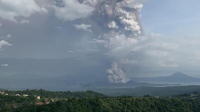 A phreatic explosion from the Taal volcano is seen from the town of Tagaytay in Cavite province, southwest of Manila. AFP
