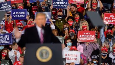 Supporters listen to President Donald Trump speak at a campaign rally at Atlantic Aviation on September 22, 2020 in Moon Township, Pennsylvania. Trump won Pennsylvania by less than a percentage point in 2016. AFP