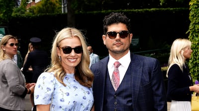 Singer Katherine Jenkins, left, and Andrew Levitas arrives during day five. PA