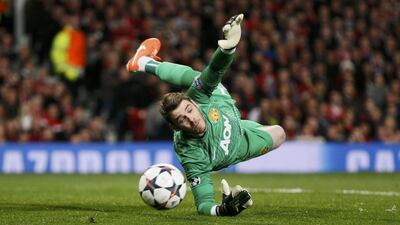 Manchester United keeper David de Gea makes a save during a 1-1 Champions League quarter-final first leg draw against Bayern Munich on Tuesday. Stefan Wermuth / Reuters / April 1, 2014