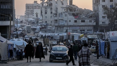 A road lined with tents occupied by displaced people in Gaza city. Taawon has invested more than $1 billion across various initiatives to support Palestinians. Bloomberg