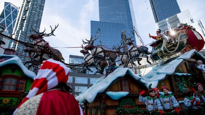 Santa's Sleigh passes Columbus Circle. AP Photo