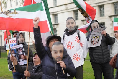 People rally opposite Downing Street in London, to protest against Iran's sentencing to death of rapper Toomaj Salehi, last month. PA