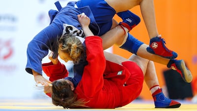 Elena Zaikina (blue) of Russia in action against Karyna Shut (red) of Belarus during their women's 80kg category final bout at the Sambo World Cup 'Kharlampiev Memorial' 2020 in Moscow, Russia. Zaikina won the competition. EPA