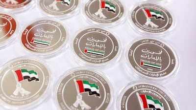 'Proud of UAE’ commemorative coins are printed in Al Quoz, Dubai. The coin has been created by Emirates Minting in collaboration with Dubai Gold District. Chris Whiteoak / The National