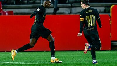 Barcelona's Lionel Messi celebrates after scoring his side's third goal. AP