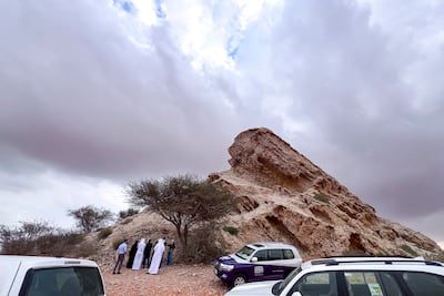Dr Osama Jamil Khalil, a world heritage expert, leads a tour at Faya in Sharjah. Ahmed Ramzan for The National