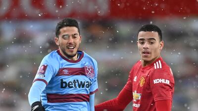 West Ham's Pablo Fornals and Mason Greenwood of United. AFP