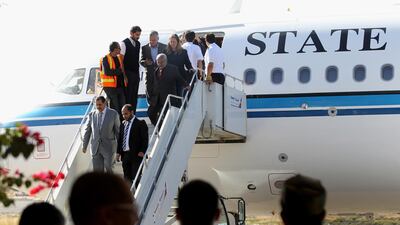 Kuwaiti ambassador to Yemen Fahd Almeie (L) disembarks from a Kuwait-chartered plane before carrying a Houthi delegation to UN-sponsored peace talks in Sweden, in Sanaa, 4 December 2018. EPA