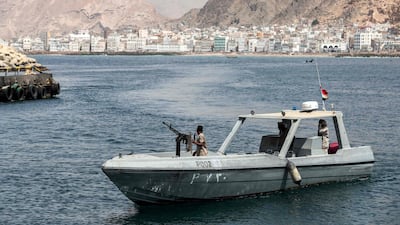 A Yemeni military patrol boat cruising past the docks in Mukalla. AFP
