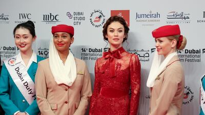 Olga Kurylenko poses during the opening night of the Dubai International Film Festival. Satish Kumar / Reuters.