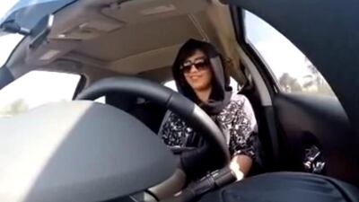 A still from a video released by Loujain Al Hathloul shows her driving towards the UAE-Saudi Arabia border before her arrest on December 1, 2014, in Saudi Arabia. Loujain Al Hathloul / AP Photo
