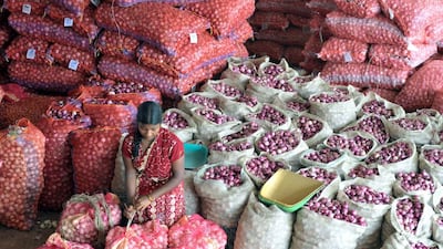 The introduction of long-delayed goods and services tax promises to simplify India’s convoluted tax regime and also drive growth. Noah Seelam / AFP