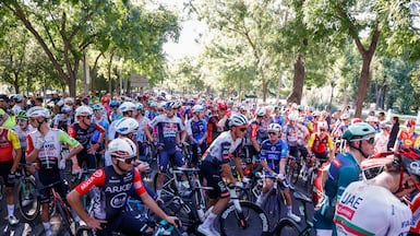 The peloton at the end of the 21st and last stage of La Vuelta a Espana cycling race between Alalpardo and Madrid, in Madrid, Spain, 14 September 2025. The stage covers 103,6 km. La Vuelta ended 56 kilometres short of the finish line at Plaza de Cibeles due to demonstrations and disturbances by pro-Palestinian groups that invaded the main streets of Madrid, forcing the police to intervene. EPA / Javier Lizon