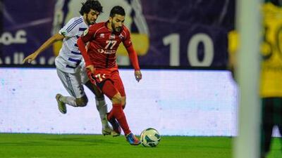 Al Shaab, in red, were surprise winners against Al Ain, the defending champions, on Saturday. The hosts eked out a 1-0 victory to keep alive their hopes of staying up next season. Courtesy Al Ittihad