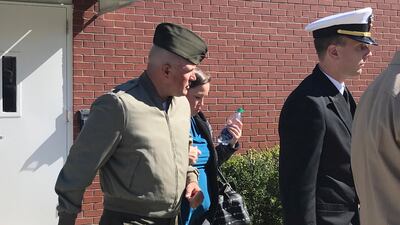 US Marine Gunnery Sergeant Joseph Felix leaves the court with his wife and lawyers after testimony at Camp Lejeune, North Carolina, on October 31, 2017. Rory Laverty / The Washington Post via AP