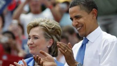 Tough talk on Iran has also been a hallmark of the US presidential campaign. Democratic presidential candidate Barack Obama and Hillary Clinton applaud together at a campaign event in Unity on June 27, 2008.