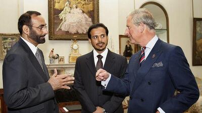 Prince Charles, right, meets Sheikh Sultan bin Tahnoon Al Nahyan, chairman of the Abu Dhabi Tourism Authority and the Tourism Development and Investment Company, centre, and Mohammed al Bowardi, secretary general of the Executive Council of Abu Dhabi, left, at Clarence House in London yesterday.