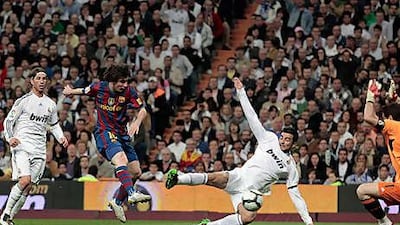 Real Madrid, in white, and Barcelona are such dominant forces in Spain, they are in a position to negotiate bigger television contracts worth more than any English club receives.