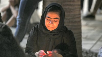 Students at New York University Abu Dhabi hold a vigil on Saadiyat Island in solidarity with the victims of the Christchurch mosque shootings and their families. Khushnum Bhandari for The National