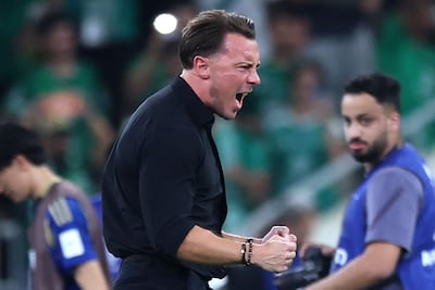 Al Ahli's German coach Matthias Jaissle celebrates with his team after they beat Machida Zelvia 1-0 to win the final of the AFC Champions League. AFP