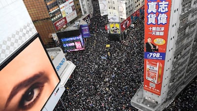 People attend a Human Rights Day march in the district of Causeway Bay in Hong Kong. Reuters