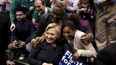 Hillary Clinton with supporters after a rally in New York on Monday. She has made an effort to attract younger voters in her bid to win the Democract nomination. Mike Segar / Reuters