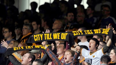 Hull City fans have come out in full protest against changing the club's name to "Hull Tigers". Paul Ellis / AFP