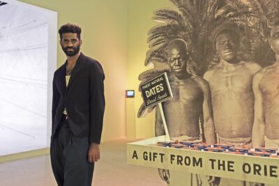 Christopher Benton with his work 'The World Was My Garden'. Vidhyaa Chandramohan / The National