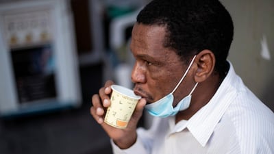 A customer sips the Turkish espresso that Mr Al Khawaldi has been making in Dubai since 1981.