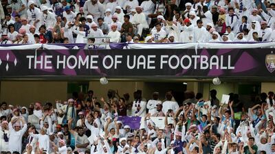 Vincent Kompany, the City captain, raised the Premier League trophy as fireworks illuminated the sky to add to the night of celebrations. Christopher Pike / The National